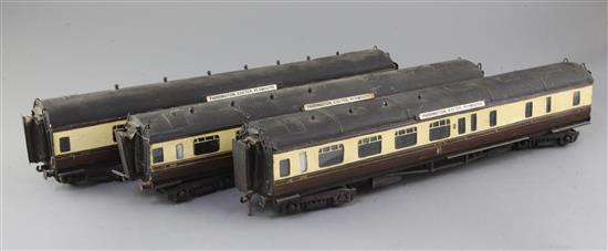 A set of three GWR corridor coaches, nos. 4127, 7142 and 7103, in chocolate and cream, 1, 2 or 3 rail